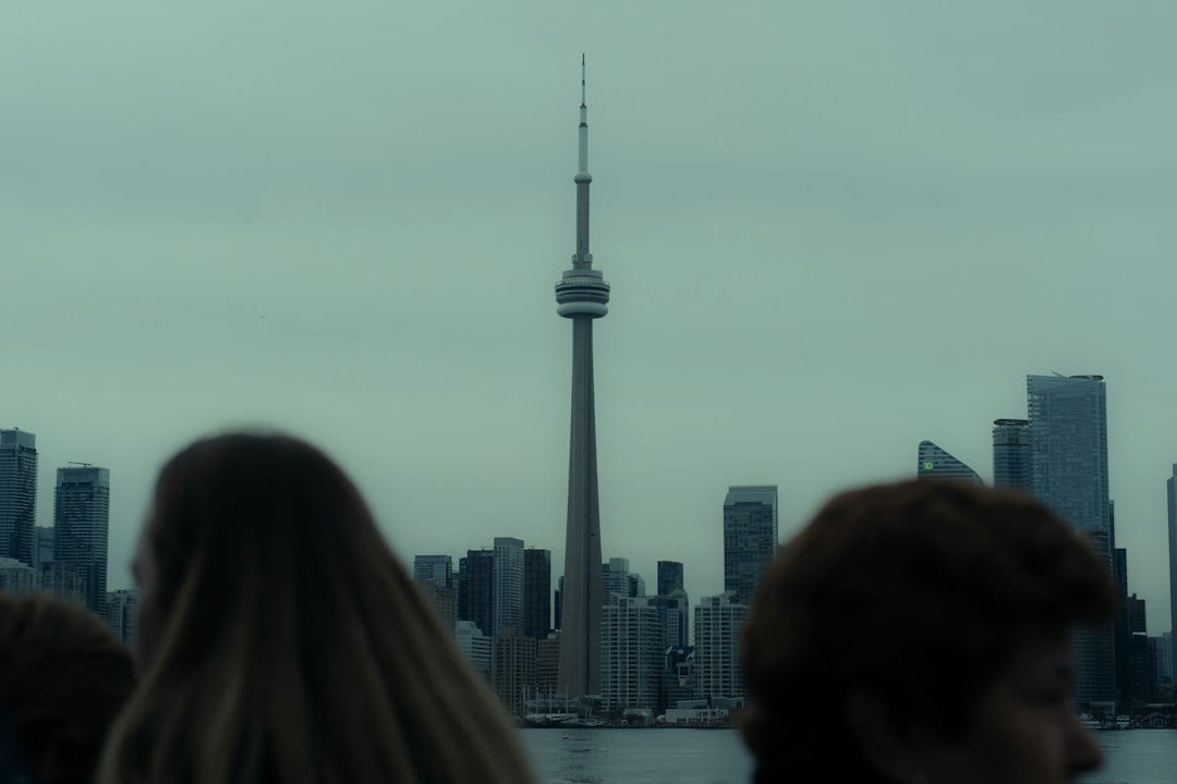 Couple with snowy Toronto skyline background